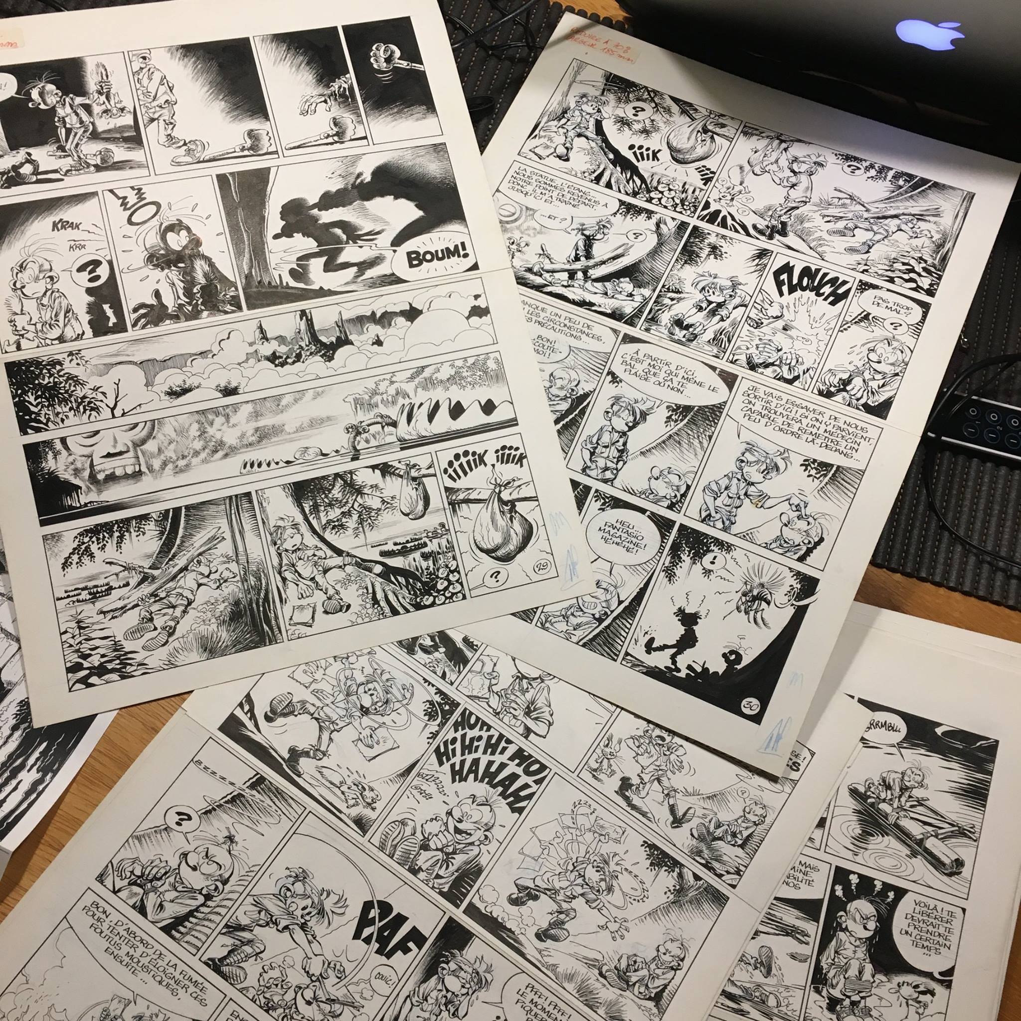 Original pages by Janry, from Spirou & Fantasio #41, 'La vallée des bannis' (ill. Tome & Janry; photo by Éditions Black & White; image from facebook.com/Editions-Black-White-320137321419027)